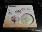   Medela -