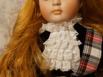    ALBERON      Scottish doll by Alberon from UK is a hand pointed porcelain doll with bright blue eyes,  