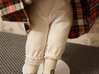    ALBERON      Scottish doll by Alberon from UK is a hand pointed porcelain doll with bright blue eyes,  