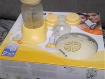    Medela Swing,    ,          ,          